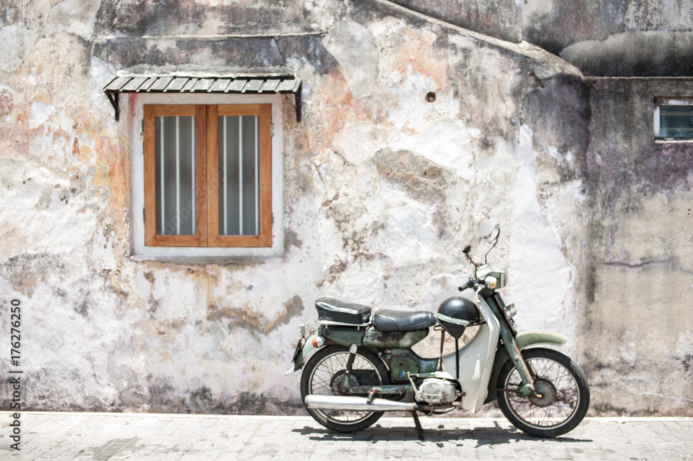 vintage look wall and motorcycle
