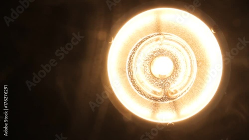 Photo studio lighting equipment on black background with smoke