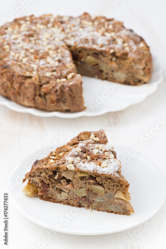 piece of homemade apple pie on white table