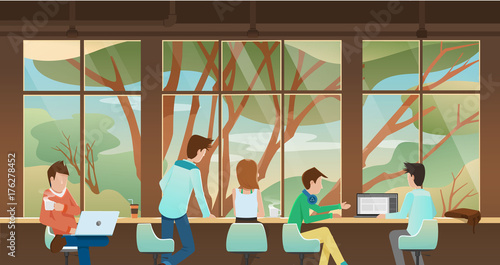  working, taking together in front of window with nature view outside.