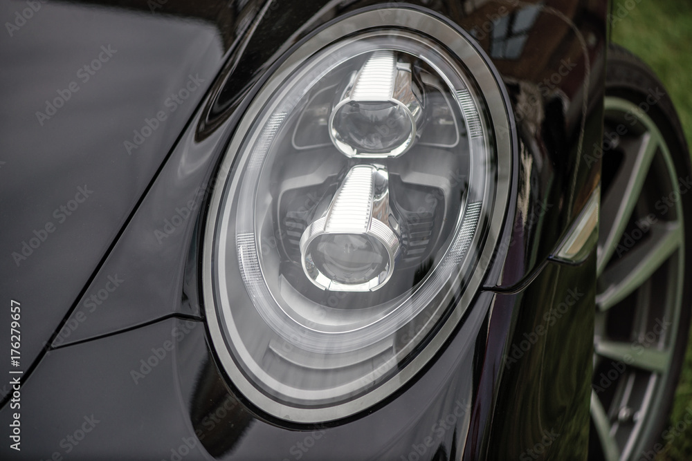 Close-up of headlights of a car