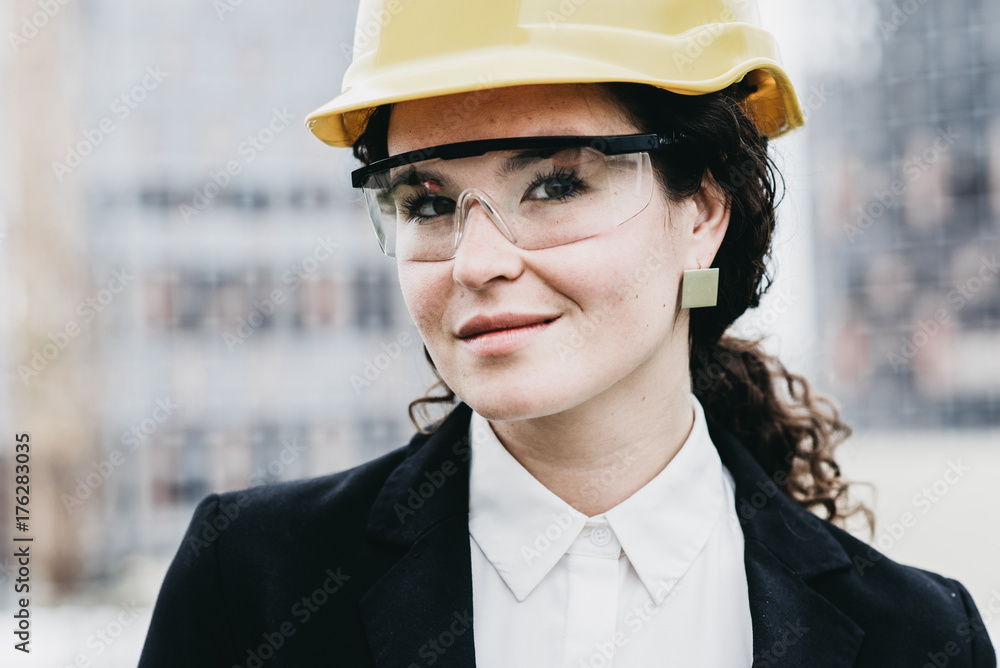 Beautiful woman civil engineer close up portrait in front Beautiful woman civil engineer close up portrait in front