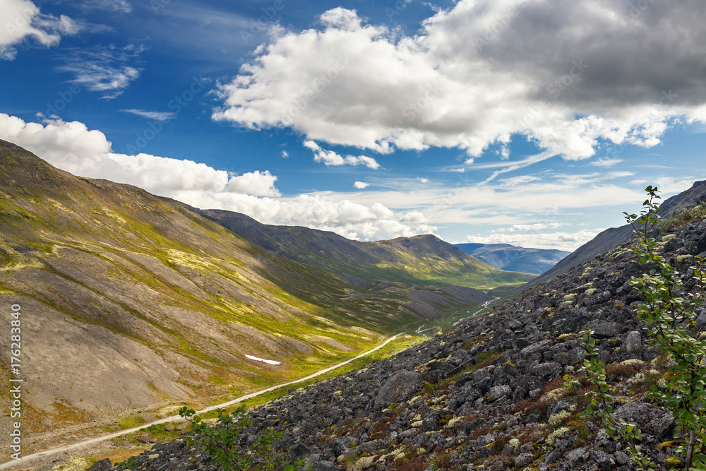 Obraz premium The tops of the Mountains, Khibiny and cloudy sky. Kola Peninsula, Russia.