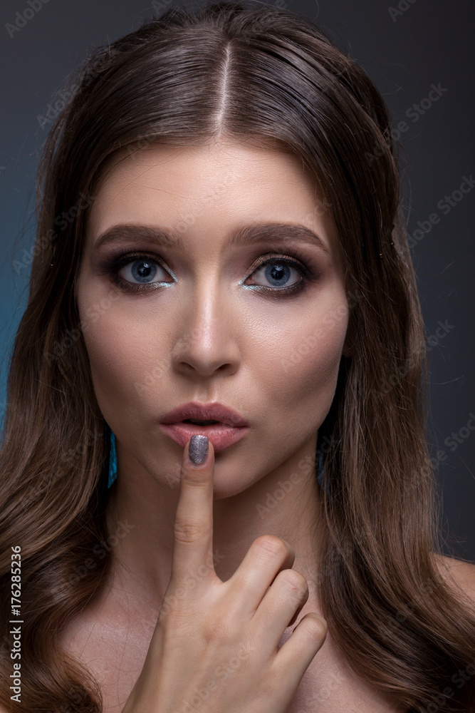 Portrait of a beautiful woman with creative make-up Portrait of a beautiful woman with creative make-up
