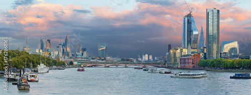 London - The evening panorama of the City with the skyscrapers in the center and Canary Wharf in the background.