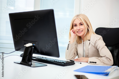 Mature businesswoman working in her office
