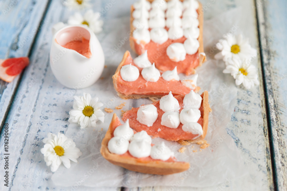Tart with grapefruit curd and merengue on top Tart with grapefruit curd and merengue on top