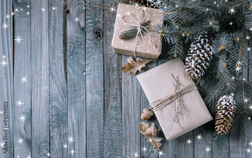 Christmas background with gift box on wooden planks