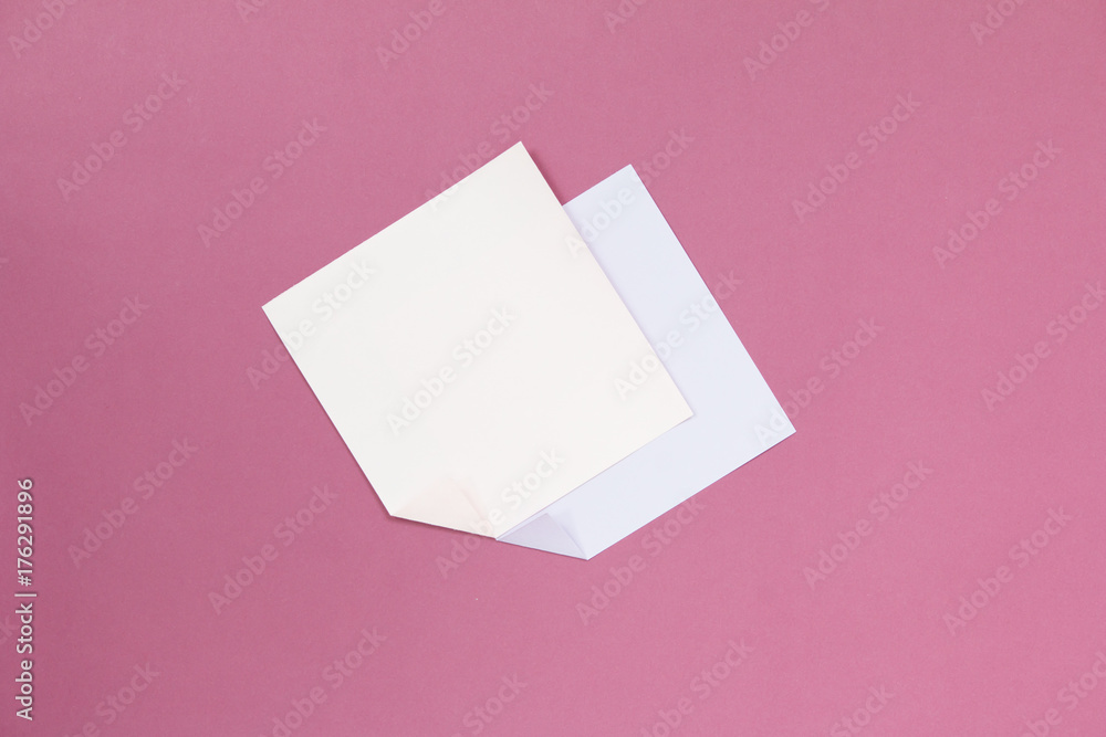 Note paper on red background. Note paper on red background.