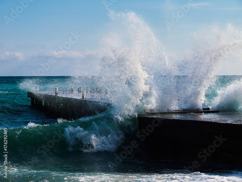 Sea splah on the empty pier