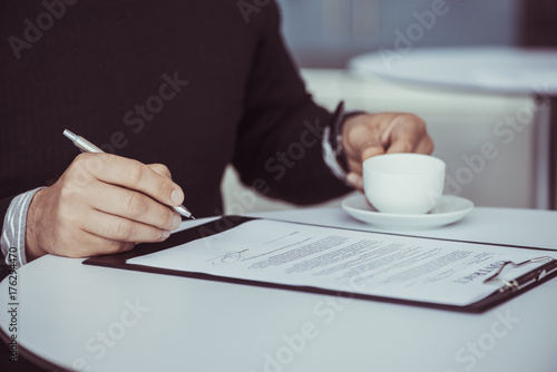 Business Person Signing Contract