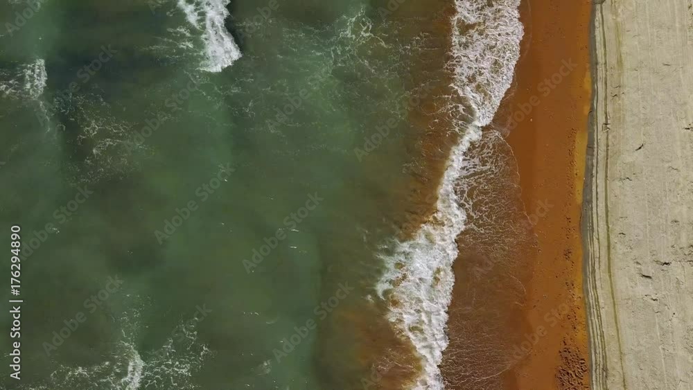 Top view of a deserted beach near the cliff. Greek coast of the Ionian Sea Top view of a deserted beach near the cliff. Greek coast of the Ionian Sea