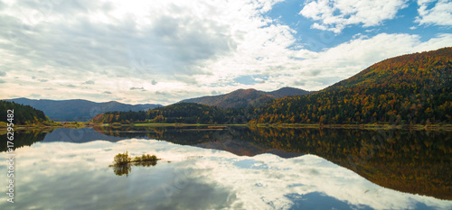 Aerial drone view of amazing autumn colors on the lake. Cerknisko lake, Slovenia