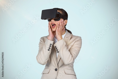 Composite image of surprised businesswoman wearing virtual video © vectorfusionart