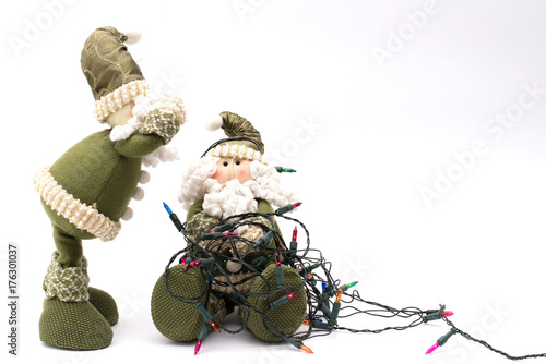 Two Santa Clauses quarreling at Christmas Lights