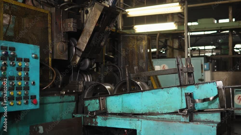 Detail is fixed in this machine to form a hump on every piece. It rolls inside of a machine then goes further. Detail is fixed in this machine to form a hump on every piece. It rolls inside of a machine then goes further.
