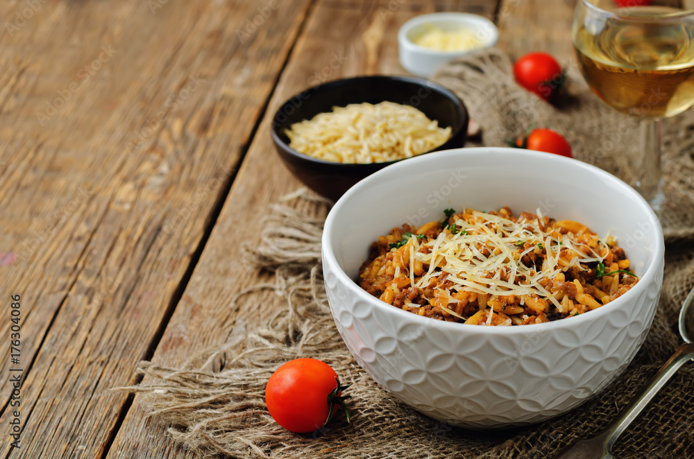 Fototapeta premium Minced meat tomato orzo