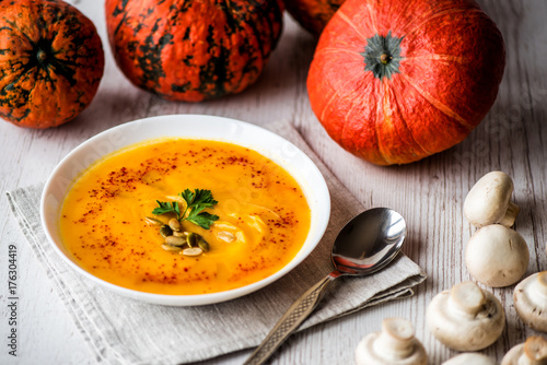 Pumpkin soup with seeds and parsley. Vegan food
