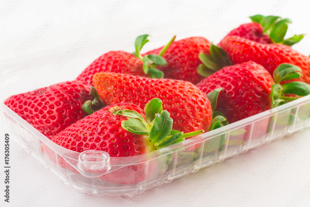 strawberry in plastic box of packaging for sale