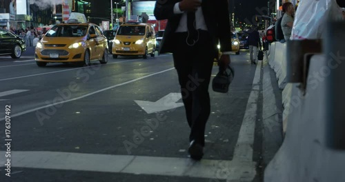 Wallpaper Mural Business man walking down night street - New York city september 12 2017 Torontodigital.ca
