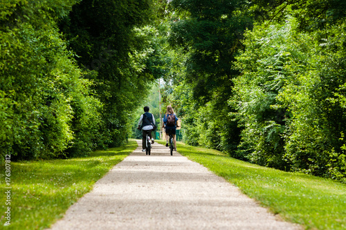 Young couple on a bike ride in the French countryside - Horizontal