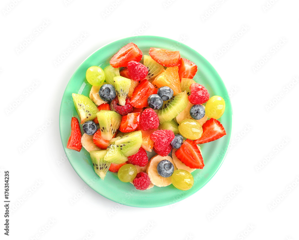 Plate with yummy fruit salad isolated on white