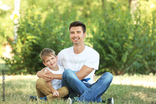 Father with son in park on sunny day © Africa Studio