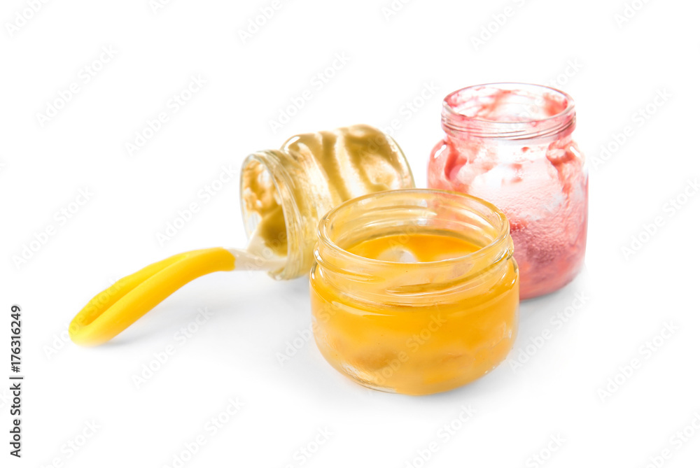 Empty baby food jars on white background Empty baby food jars on white background