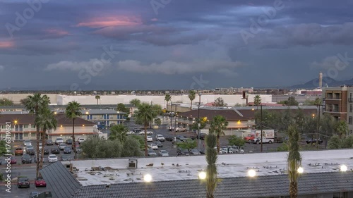 Las Vegas day to night time lapse with traffic, airport and storm clouds