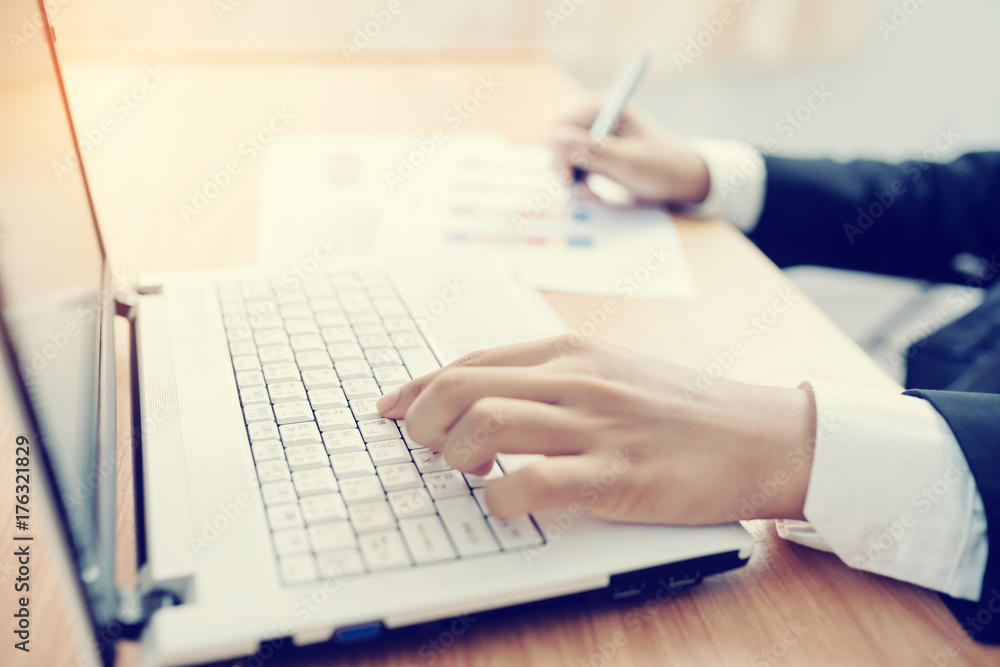 businessman using laptop and analysis many chart graph businessman using laptop and analysis many chart graph