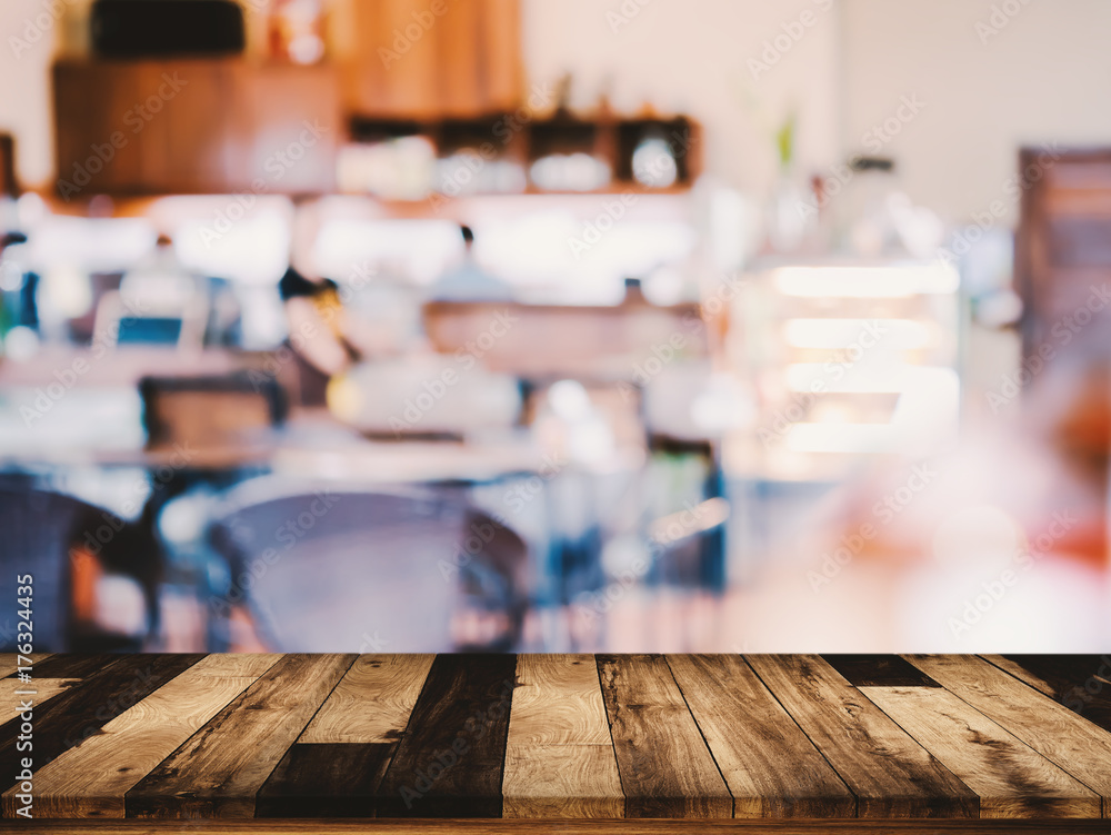 wood table with blurred interior in cafe background