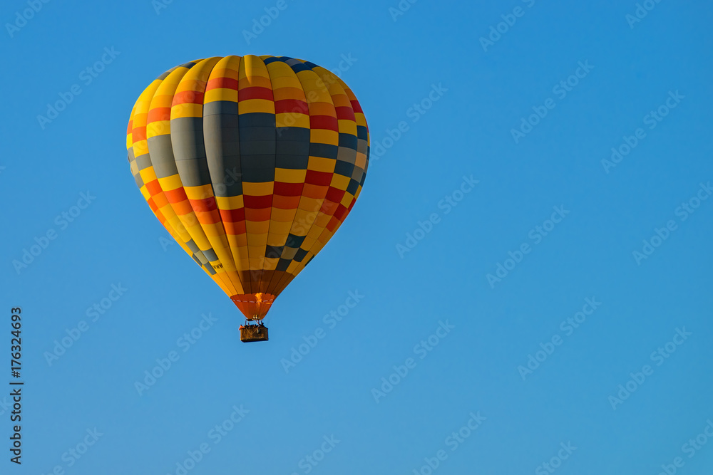 Colorful hot air balloons against blue sky Colorful hot air balloons against blue sky