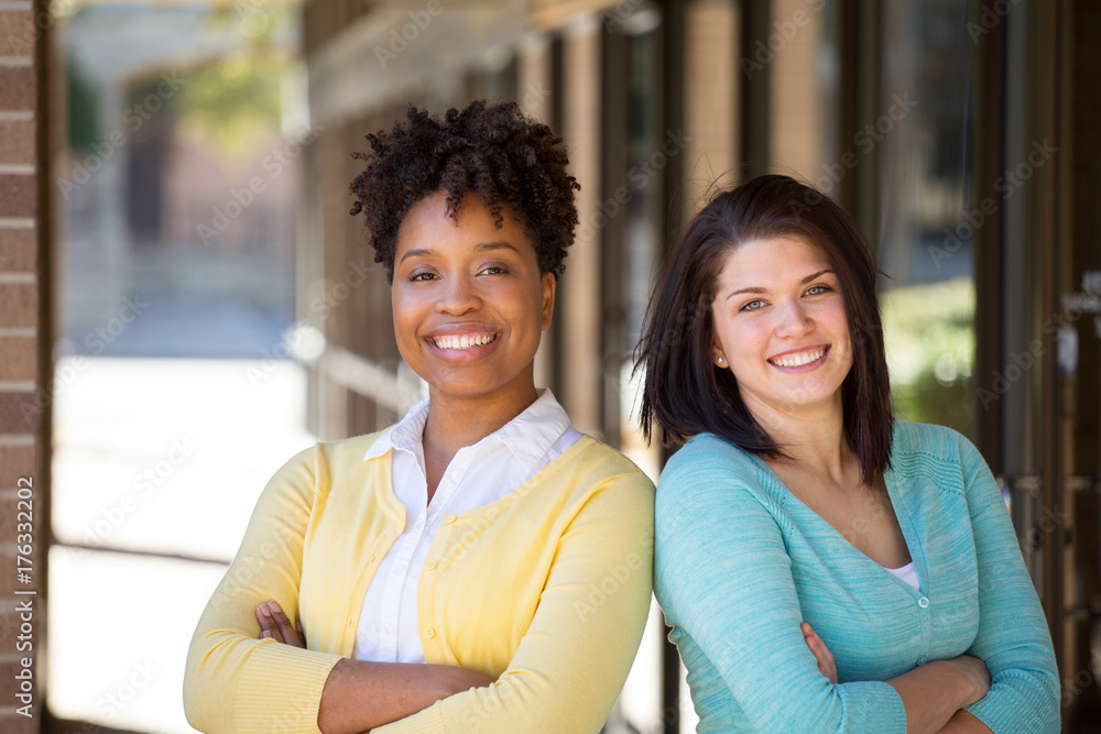 Diverse group of women working together. Diverse group of women working together.
