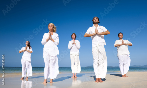 A group of people is meditating