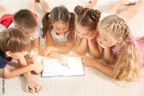 Cute little children readin...