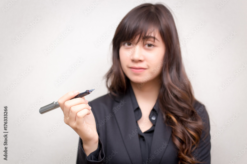 Business woman with a pen. concept for business. Business woman with a pen. concept for business.