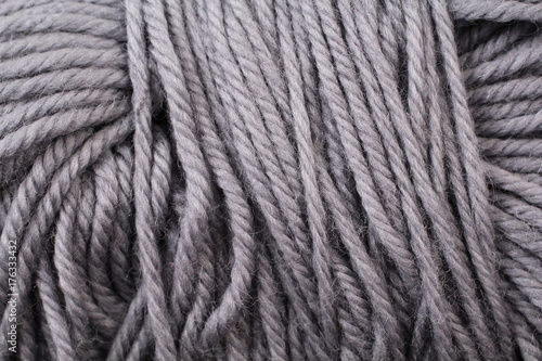 A super close up image of gray yarn
