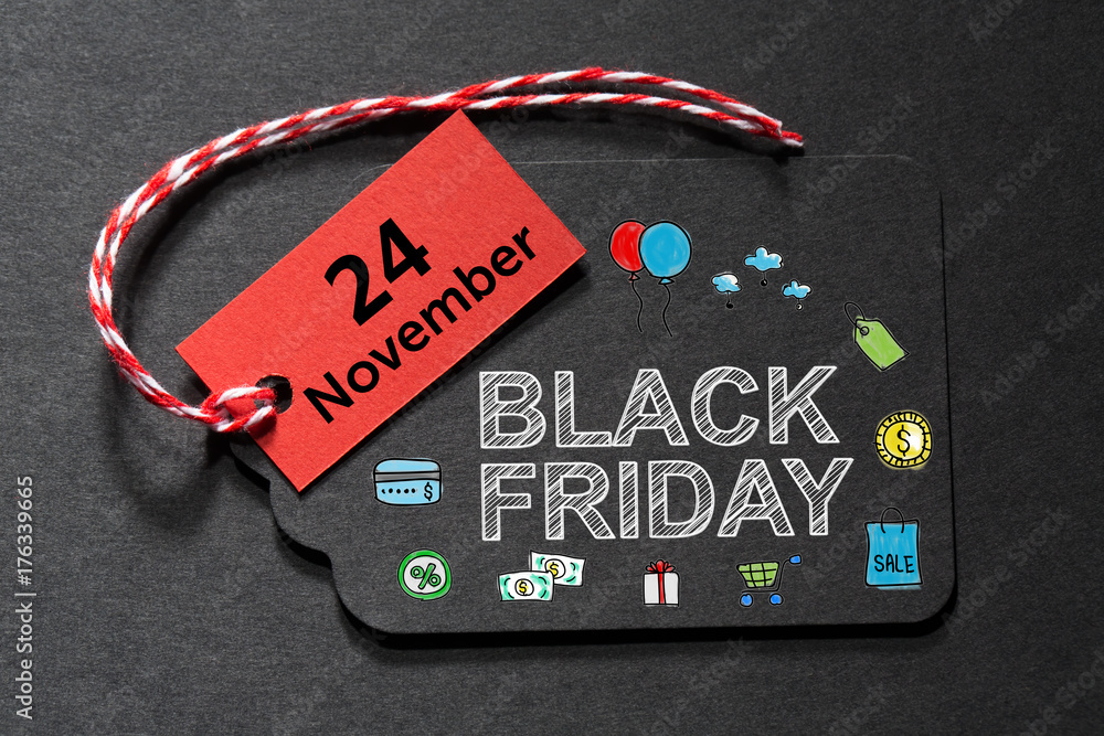 Black Friday text on a black tag with red and white twine