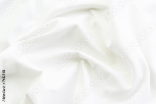 Close up of white bedding sheets and empty space for your design
