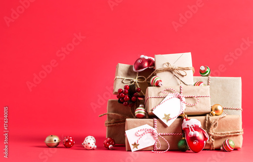 Collection of Christmas present boxes on a red background