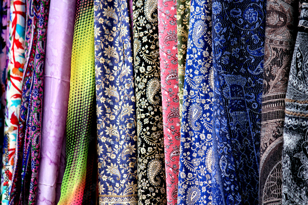 Colors of indigenous women in Samarkand, national silk made veils Colors of indigenous women in Samarkand, national silk made veils