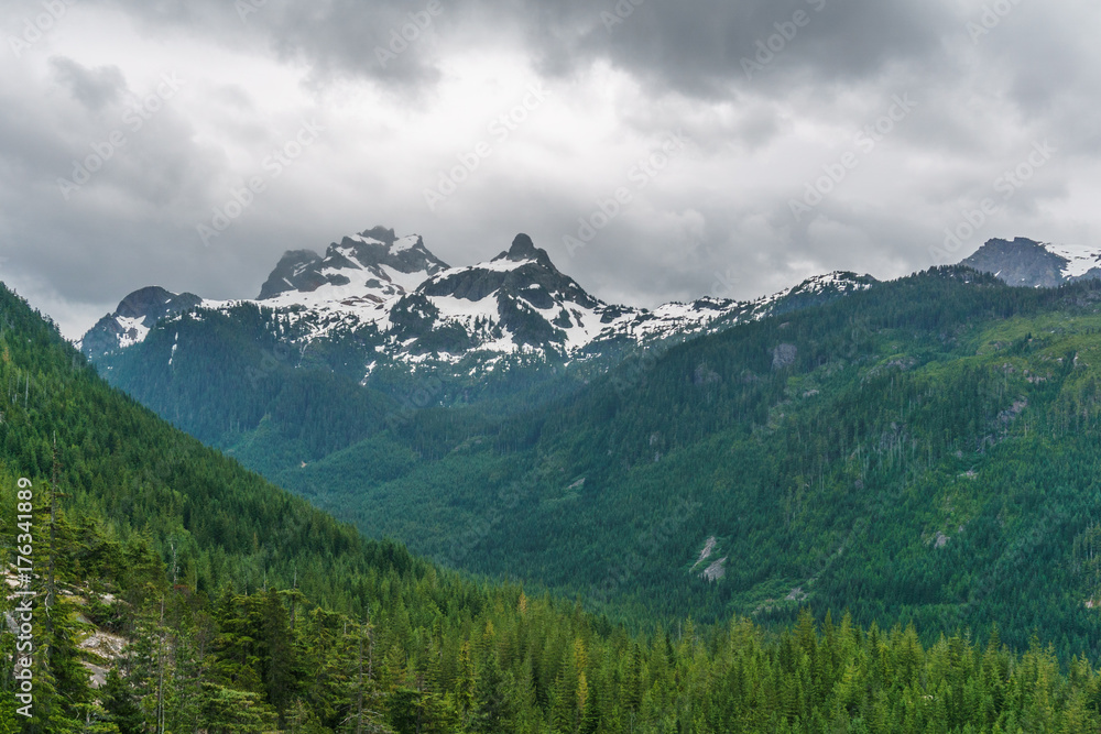 Fototapeta premium High mountain landscape with heavy rainy clouds.
