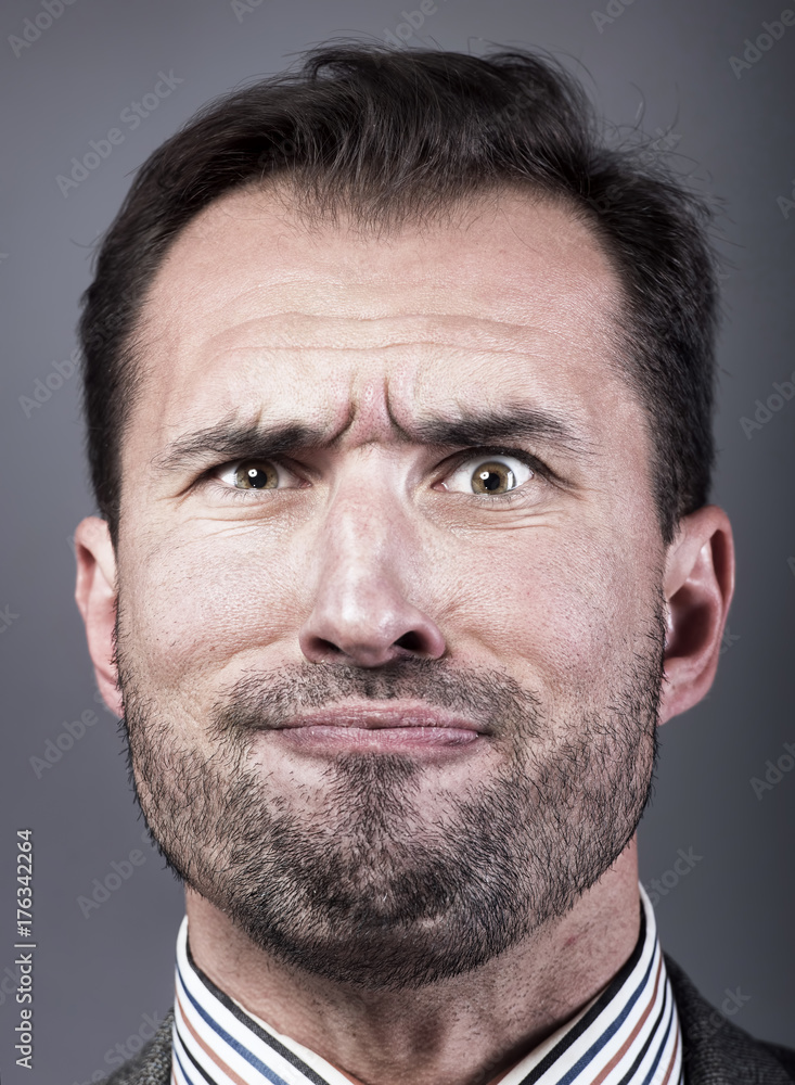 Obraz premium Man portrait with a strange expression