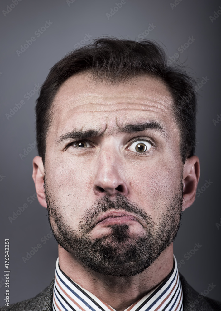 Obraz premium Man portrait with a strange expression
