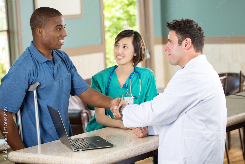 Fototapeta premium Medical team talking with patients.