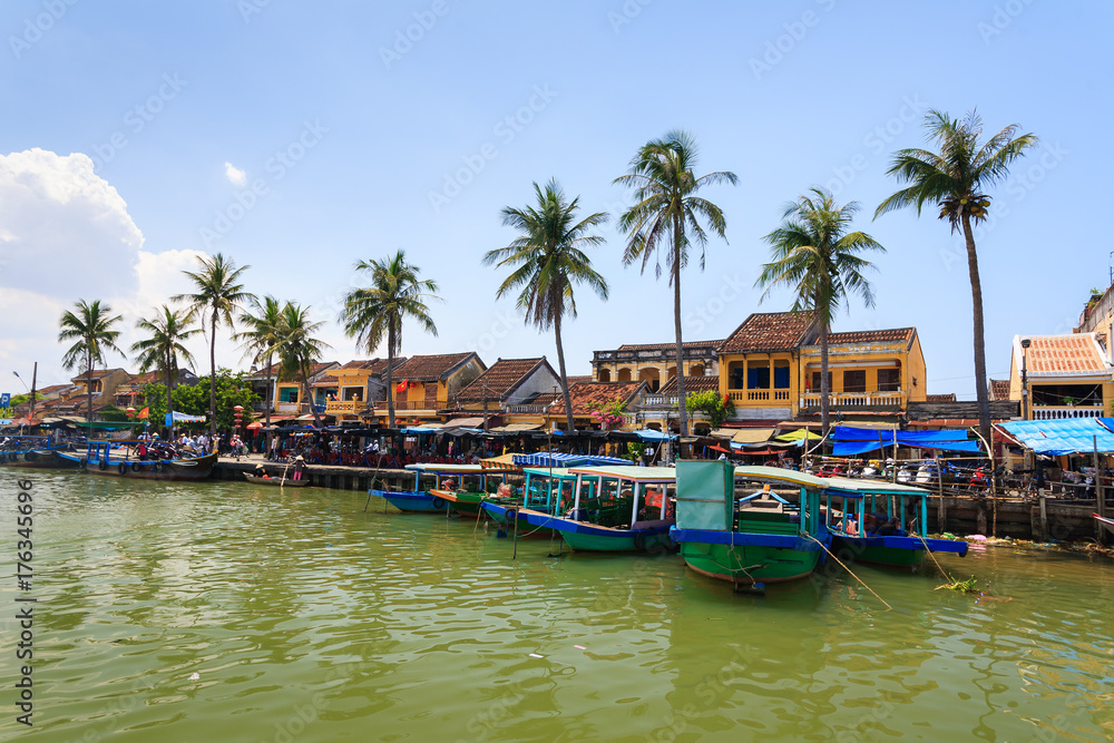 Bach Dang wharf at Hoi An Ancient Town, Quang Nam, Vietnam. Tourist can get on a boat to explore a whole lot more of Hoi An, Thu Bon river and the delta.