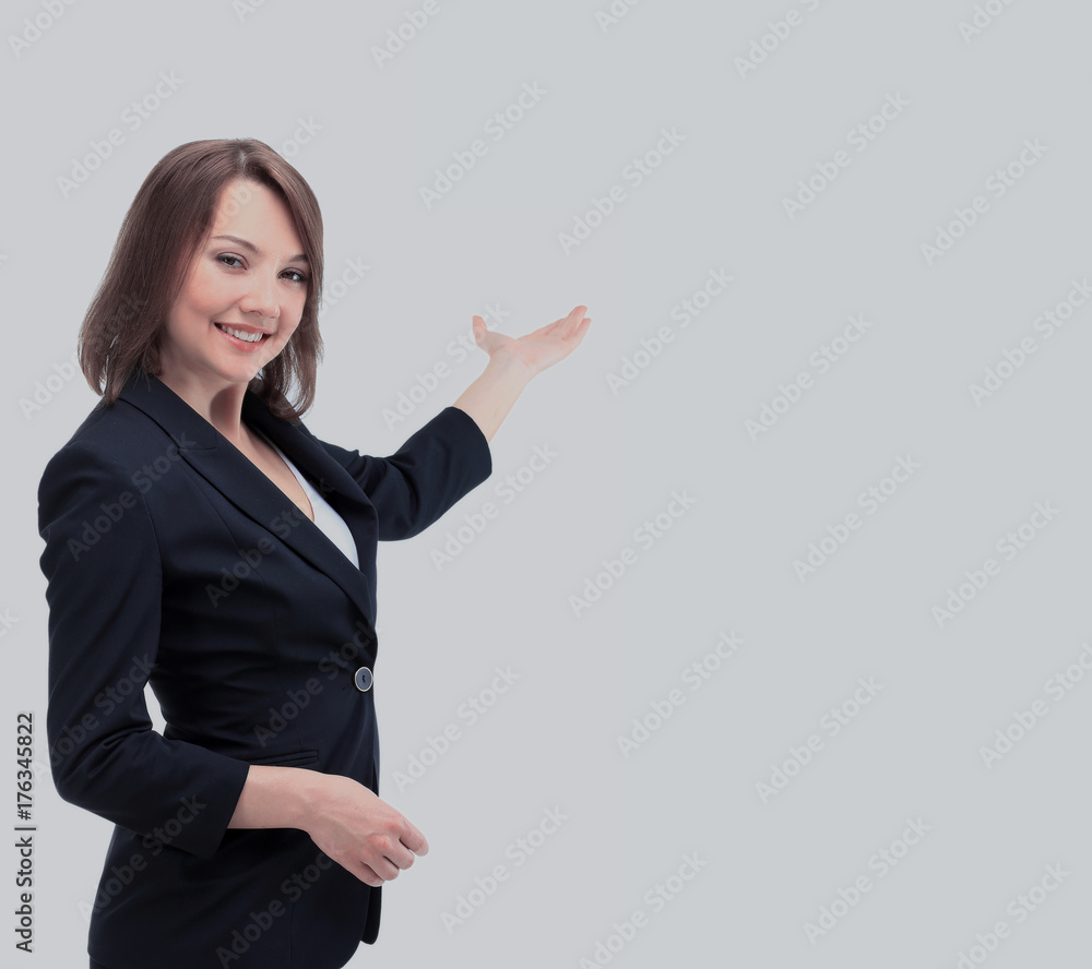 Smiling girl showing open hand palm with copy space for product Smiling girl showing open hand palm with copy space for product