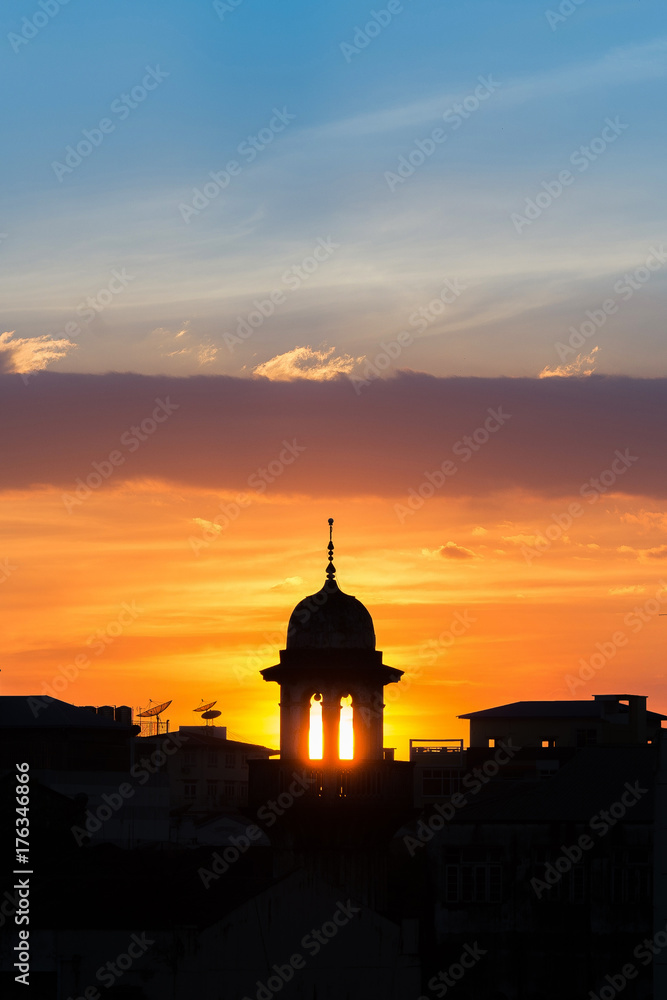 mosque silhouette with beautiful sunset background.mosque is more than a place of worship, study and discuss Islam,community centres,teach about muslim,religious festivals or Weddings