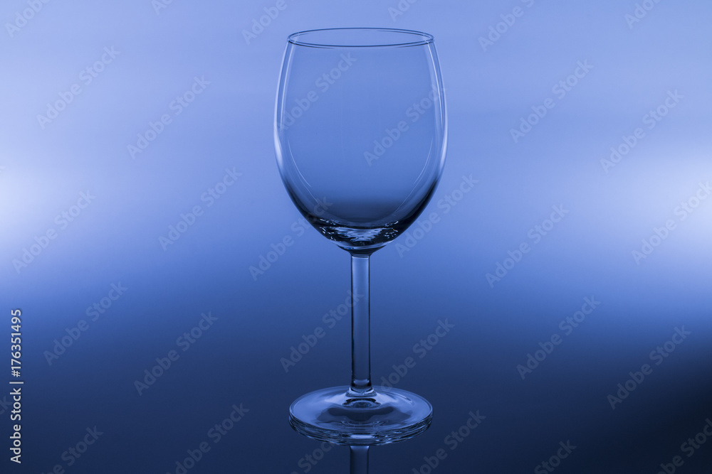wine glass on dark blue background close up wine glass on dark blue background close up