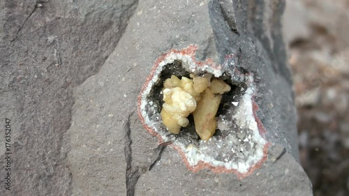 Calcite crystal in porphyry rock photo